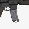 Black rifle with magazine on a white background