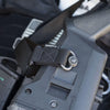 Close-up of a gun with a Magpul attachment on a blurred background