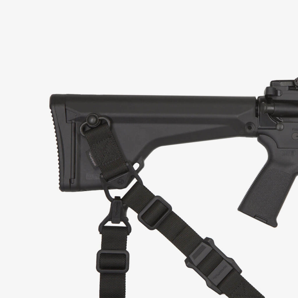Black rifle with a sling on a white background