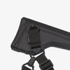 Black rifle stock with attached sling on a white background