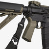 Close-up of a rifle with a sling on a white background