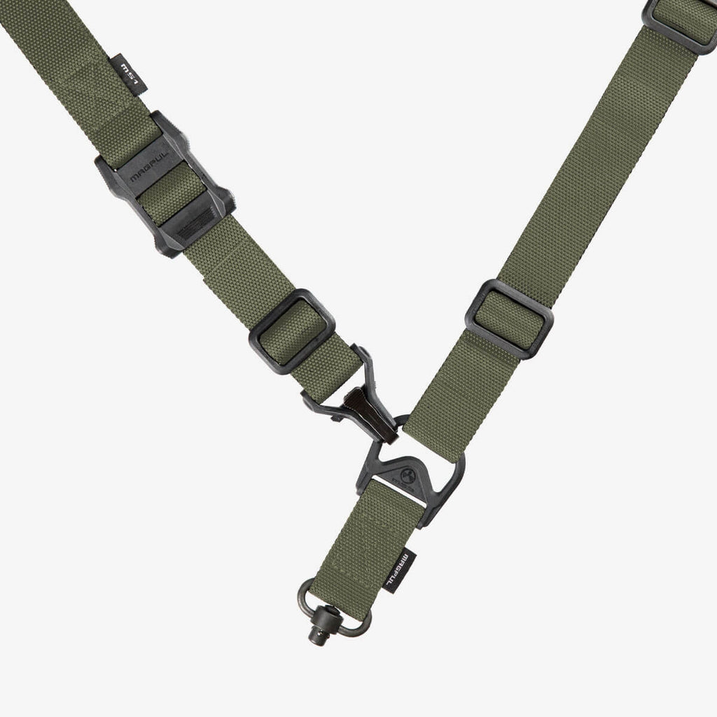 Green tactical sling with black hardware on a white background