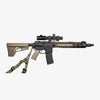 Rifle with scope and bipod on a white background