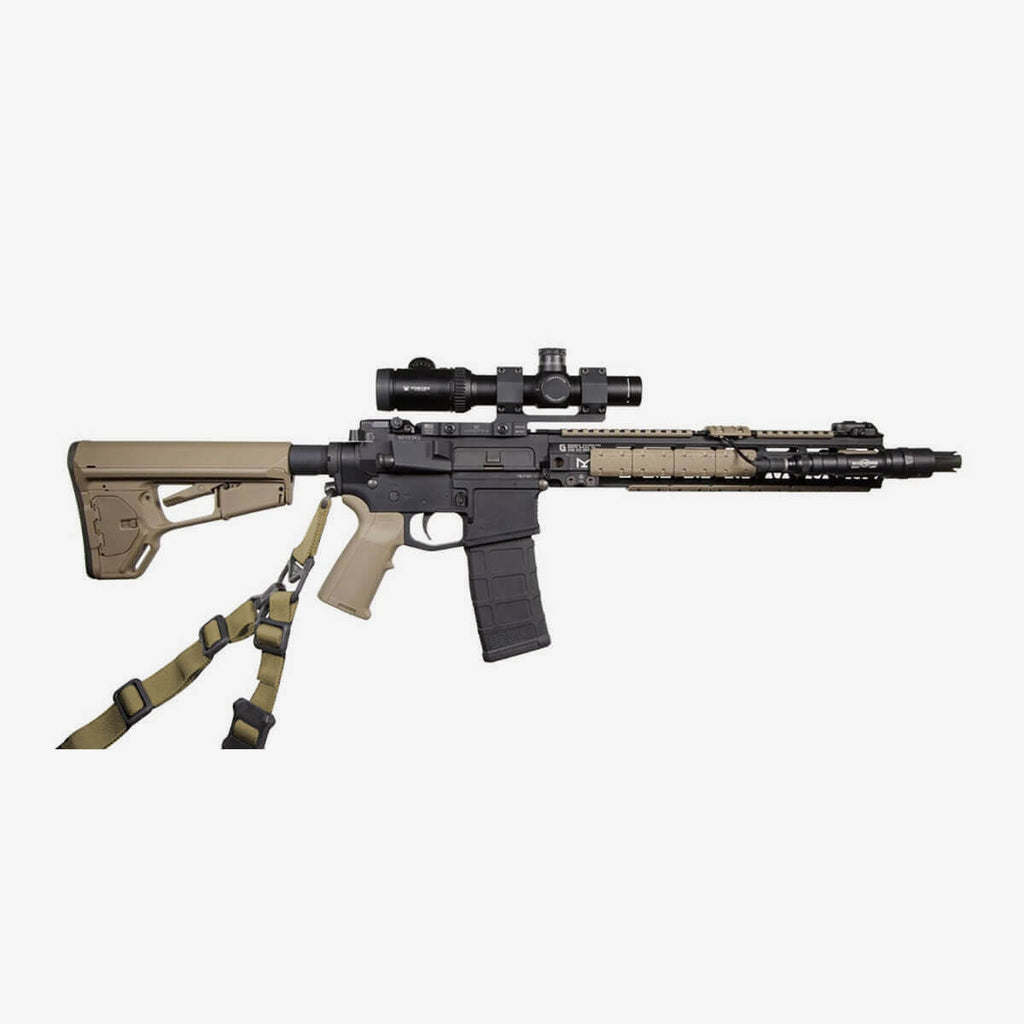 Rifle with scope and bipod on a white background
