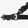 Black tactical belt with a buckle on a white background