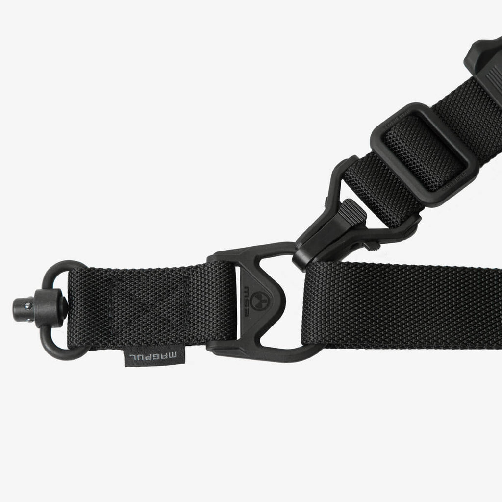 Black tactical belt with a buckle on a white background