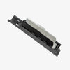Black and silver mechanical component on a white background