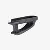 Black plastic component on a white background