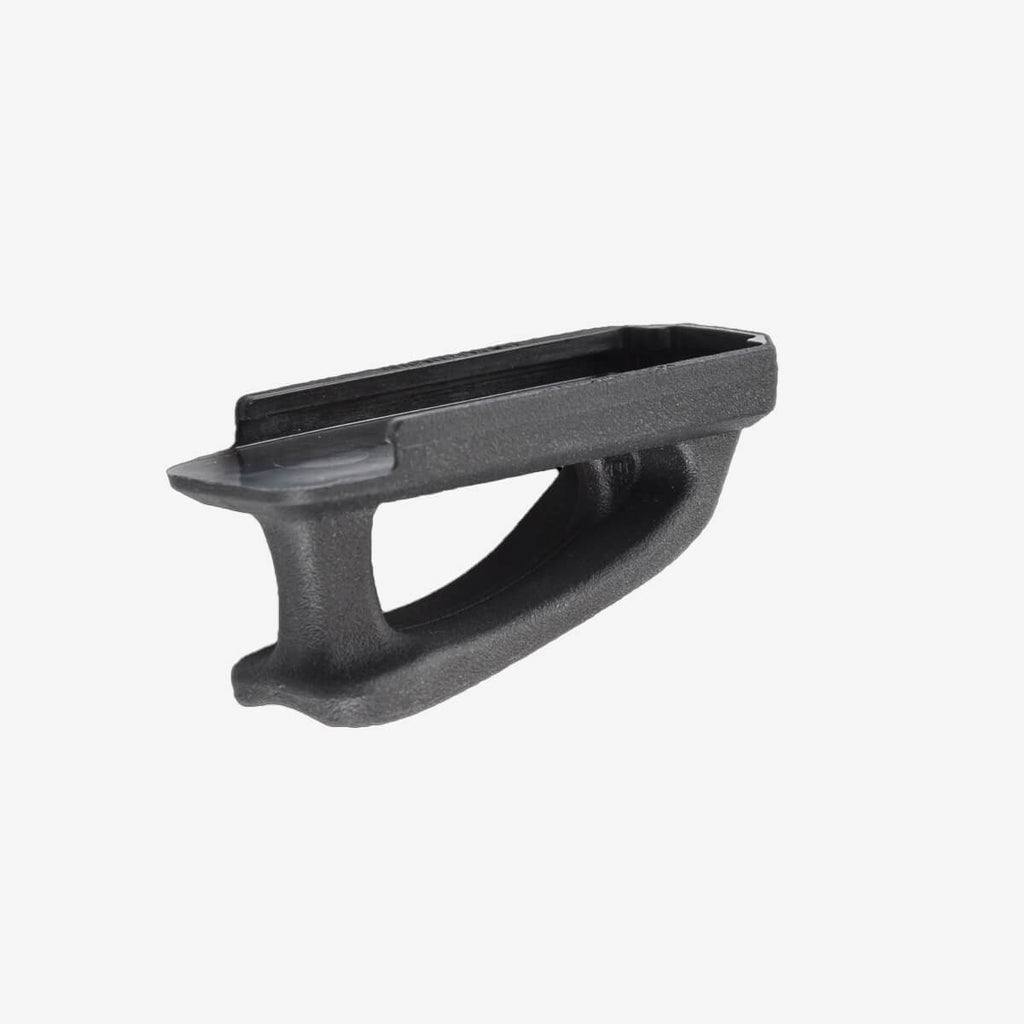 Black plastic component on a white background