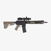 Rifle with scope on a white background