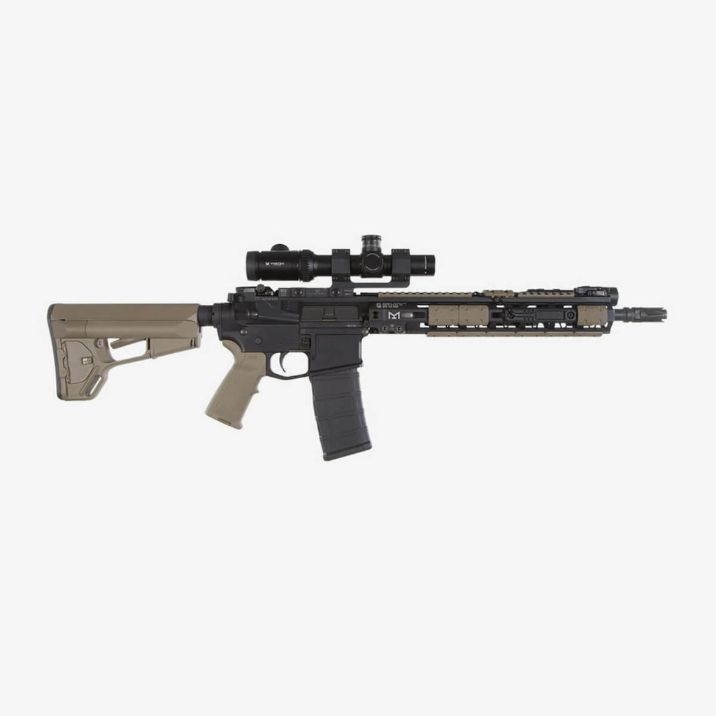 Rifle with scope on a white background