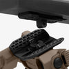 Close-up of a tactical gun mount on a rifle with a white background