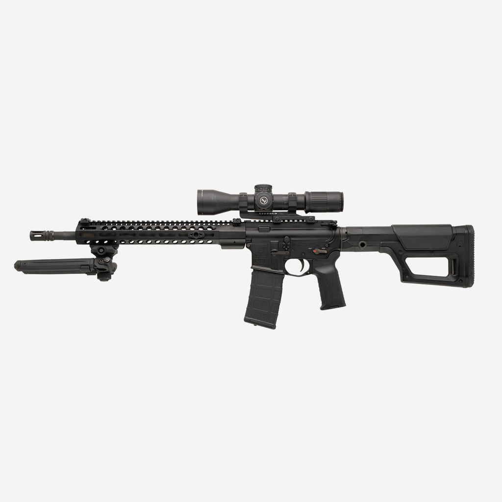 Black rifle with scope on a white background