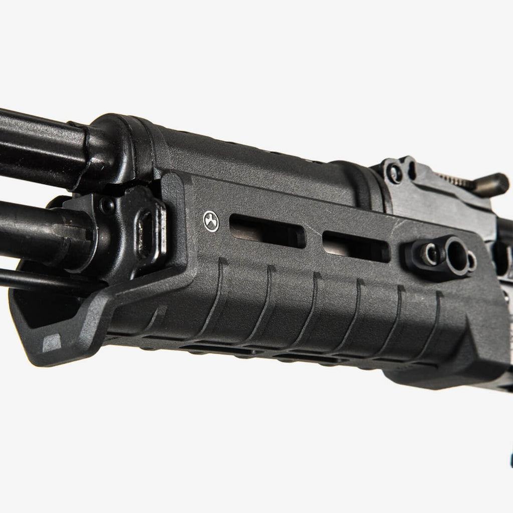 Close-up of a black firearm with a white background