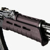 Close-up of a rifle with a MLOK rail on a white background