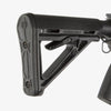 Close-up of a black rifle stock on a white background