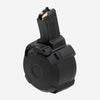 Black firearm magazine on a white background