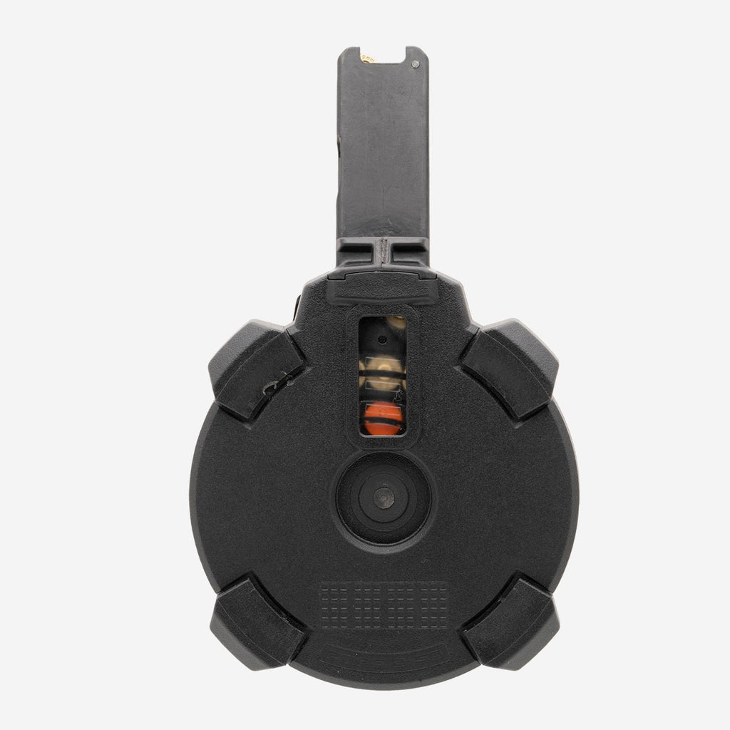 Black plastic component on a white background