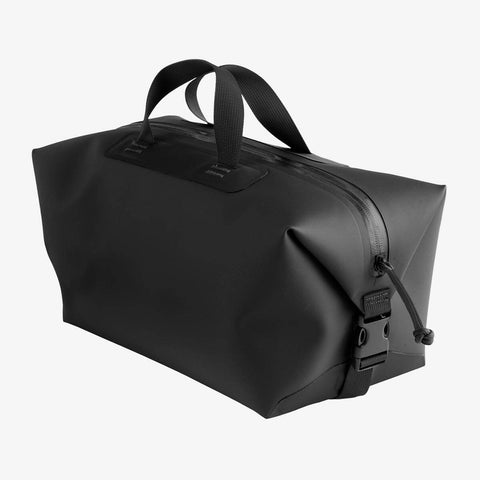 Black duffel bag on a white background