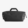 Black duffel bag on a white background