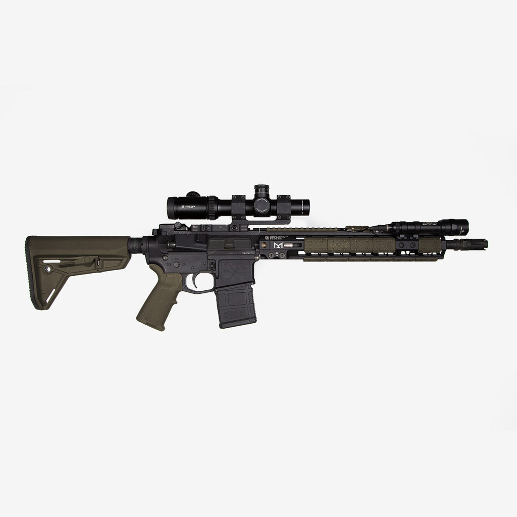 Rifle with scope on a white background