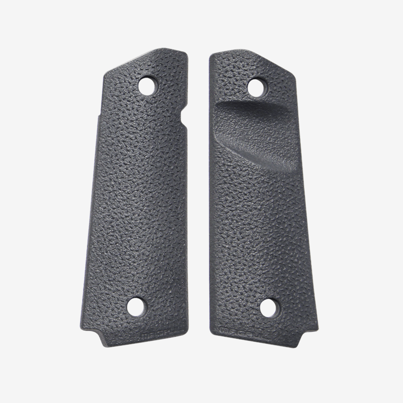 Two black textured gun grips on a white background