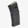 Black rifle magazine with ammunition on a white background