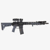 Black rifle with scope on a white background