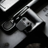 Close-up of a car key fob attachment on a vehicle's ignition area.
