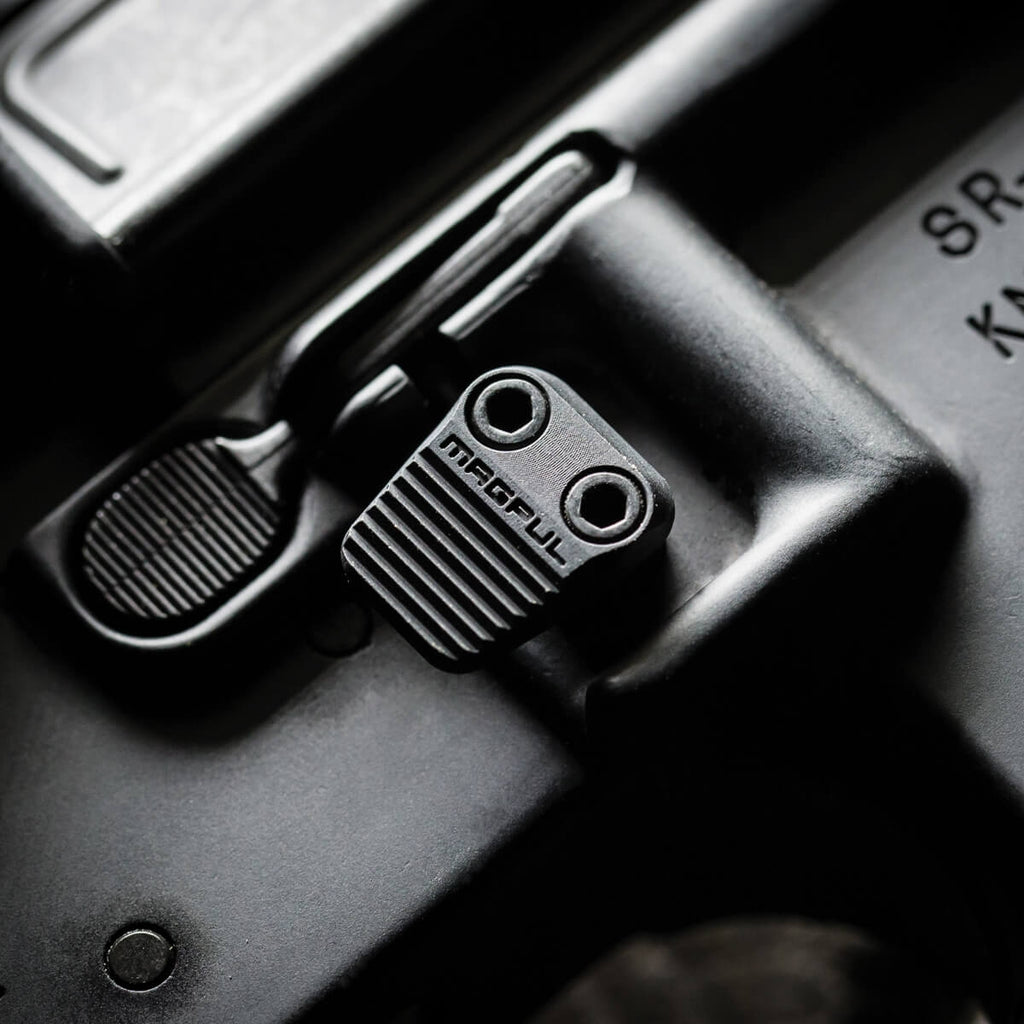 Close-up of a car key fob attachment on a vehicle's ignition area.