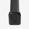 Black cylindrical object with textured surface on a white background