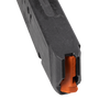 Close-up of a black gun magazine with an orange follower on a white background