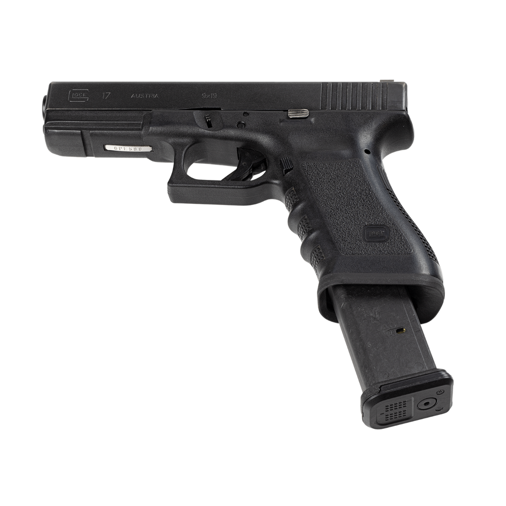 Black handgun with magazine on a white background