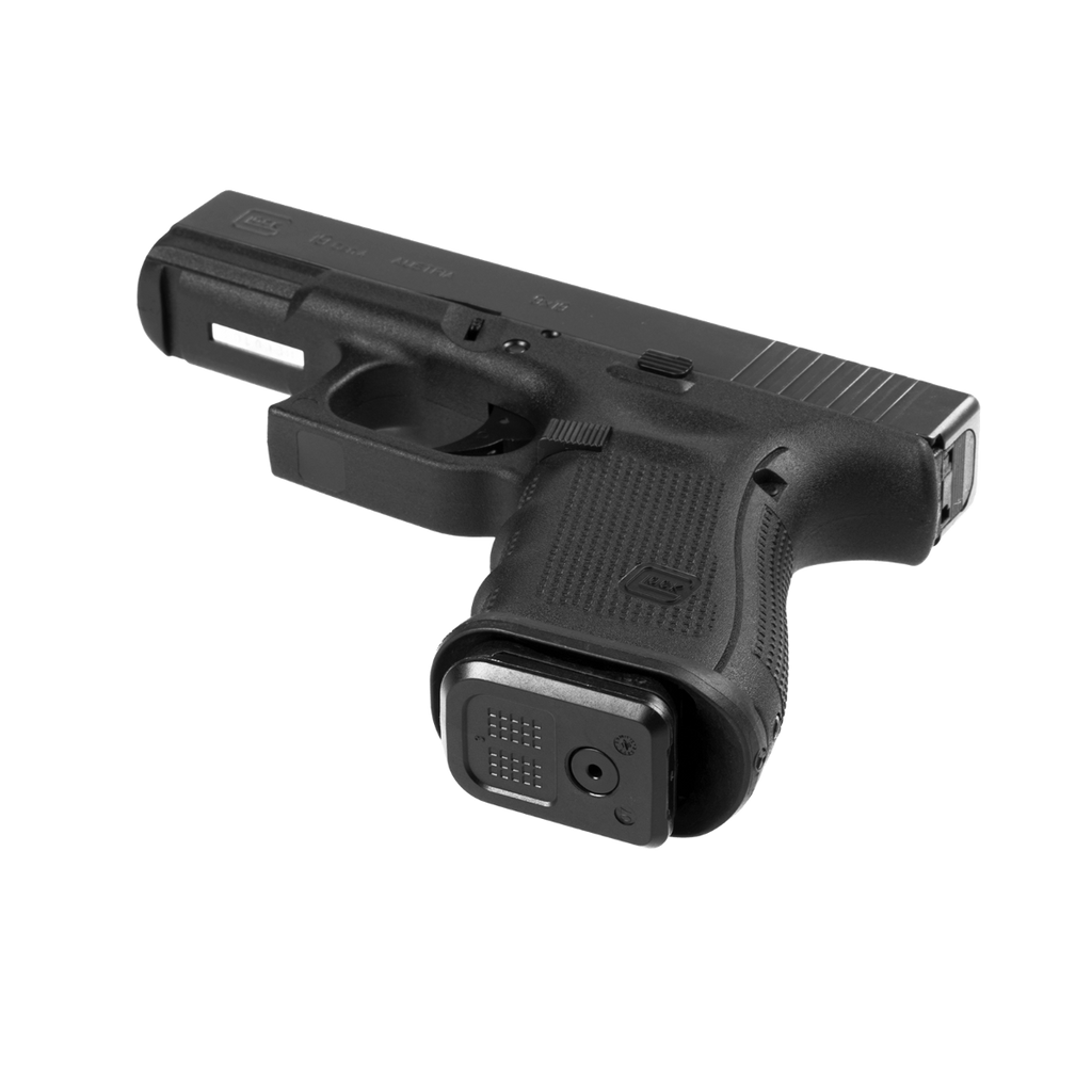Black handgun on a white background