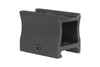 Black plastic component on a white background