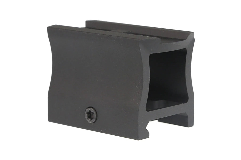 Black plastic component on a white background