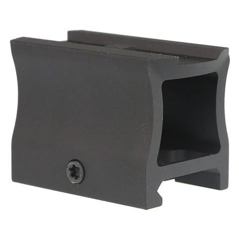 Black plastic component on a white background