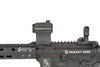 Close-up of a rifle with Primary Arms optics and branding on a white background