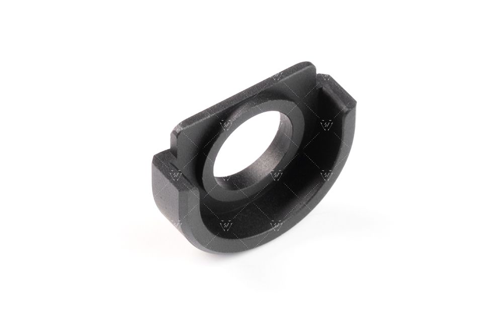 Black metal cylindrical component on a white background