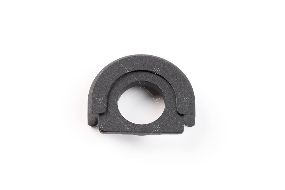 Black rubber grommet on a white background