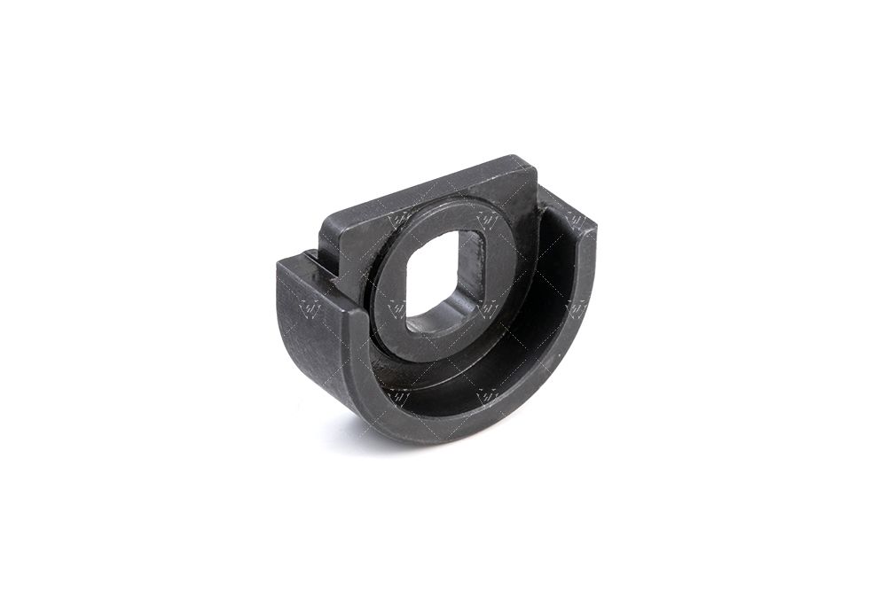 Black mechanical component on a white background