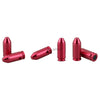 Red metallic bullet-shaped objects on a white background