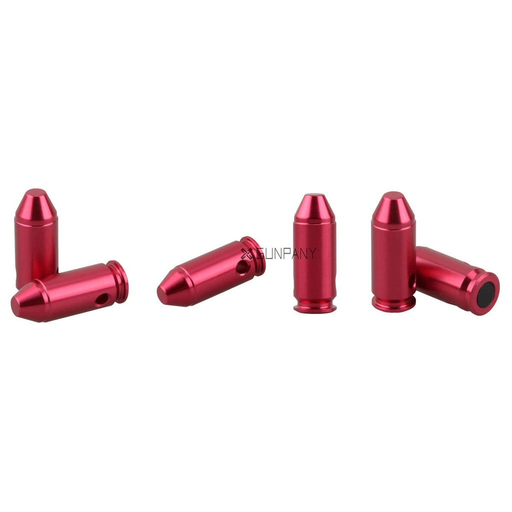 Red metallic bullet-shaped objects on a white background