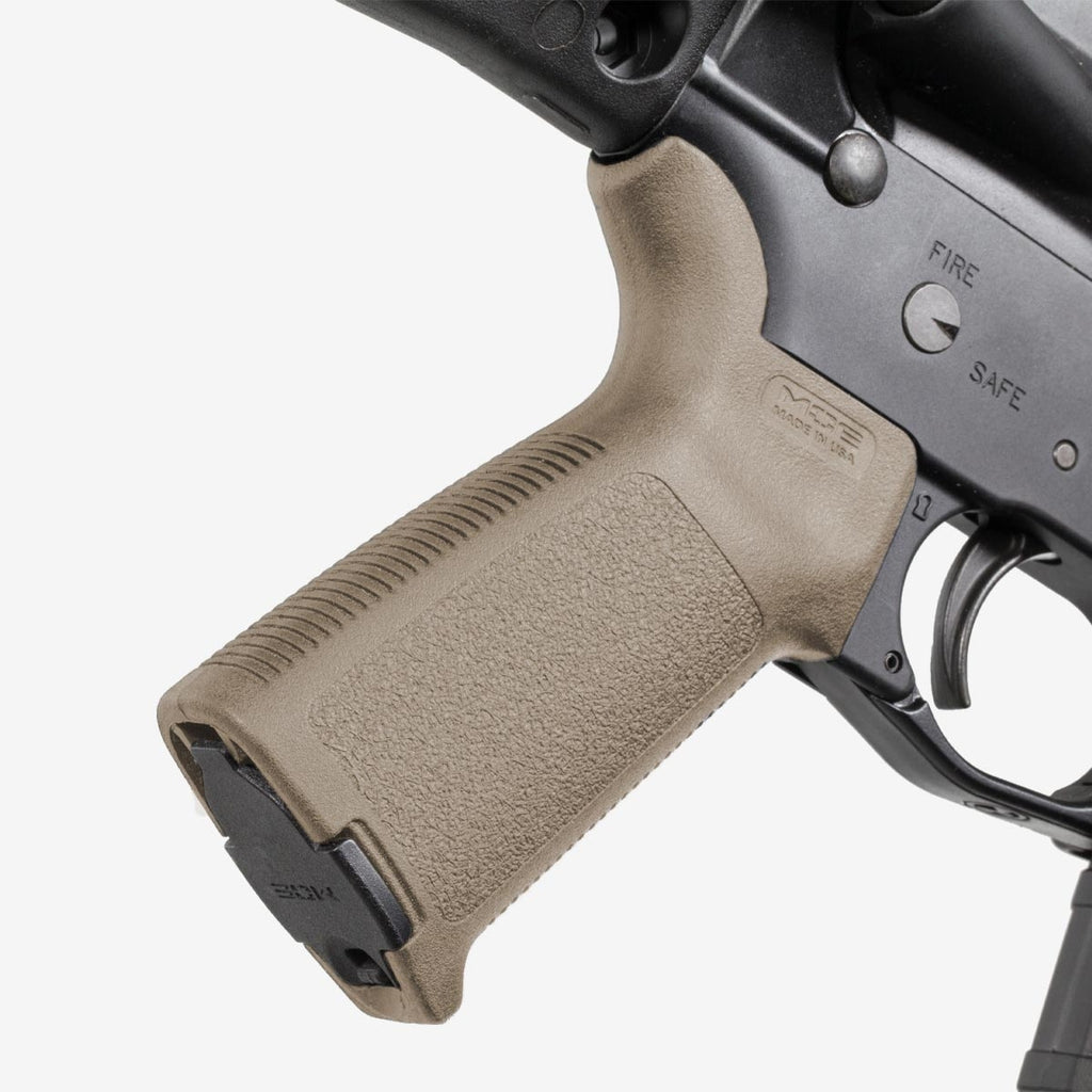 Close-up of a rifle with a tan grip on a white background